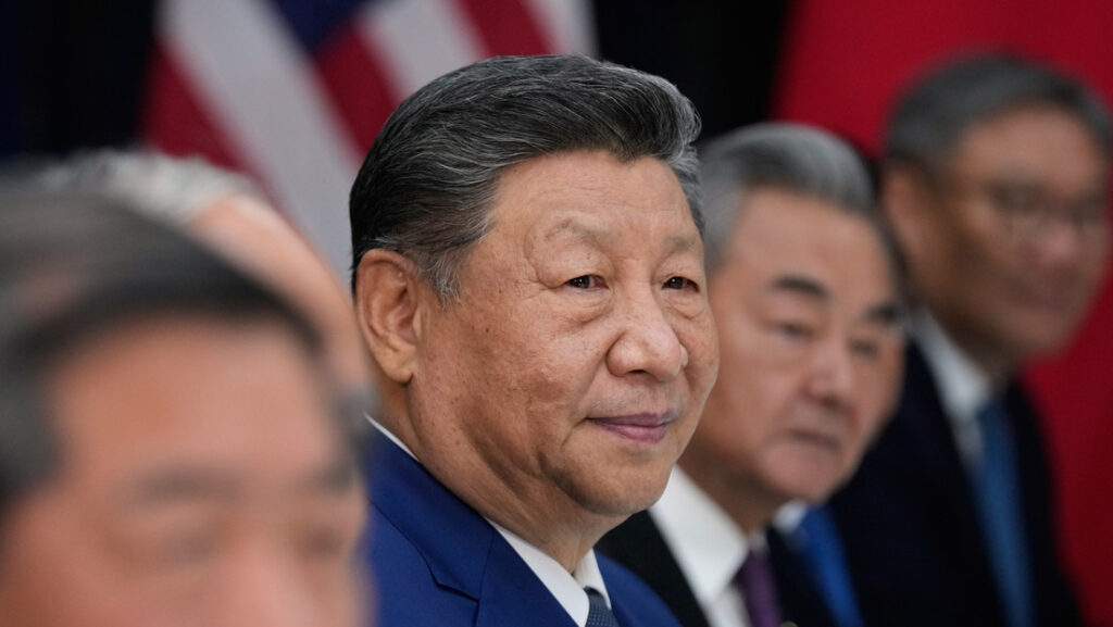 Xi